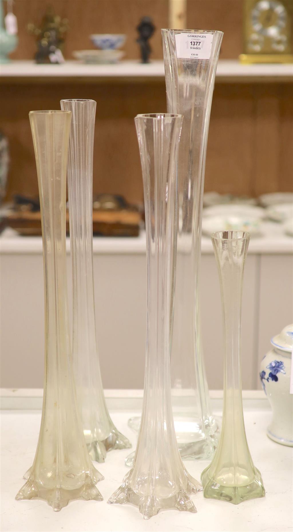 Five late Victorian tall fluted glass flower vases, 59.5cm high